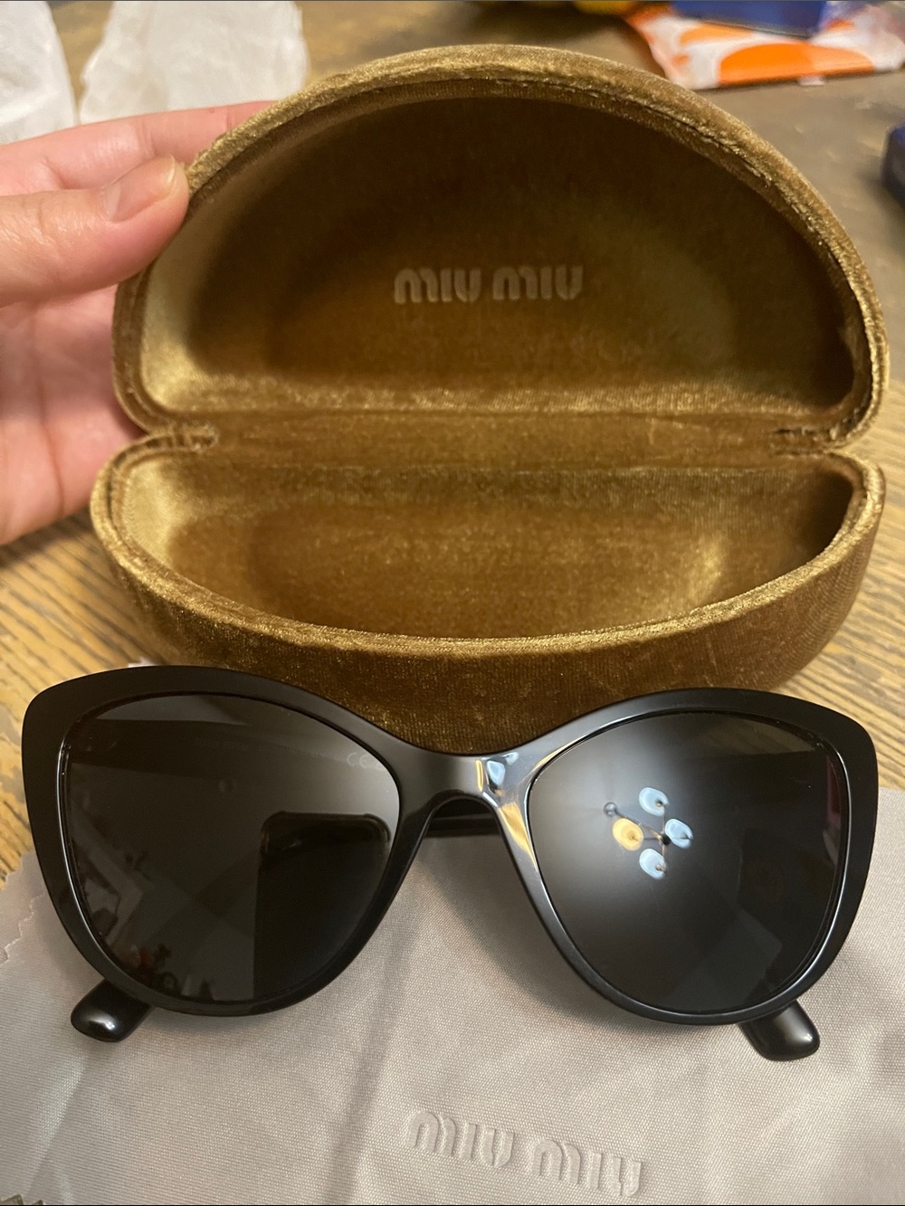 Miu Miu Black Cat-Eye Sunglasses with Dark Lenses